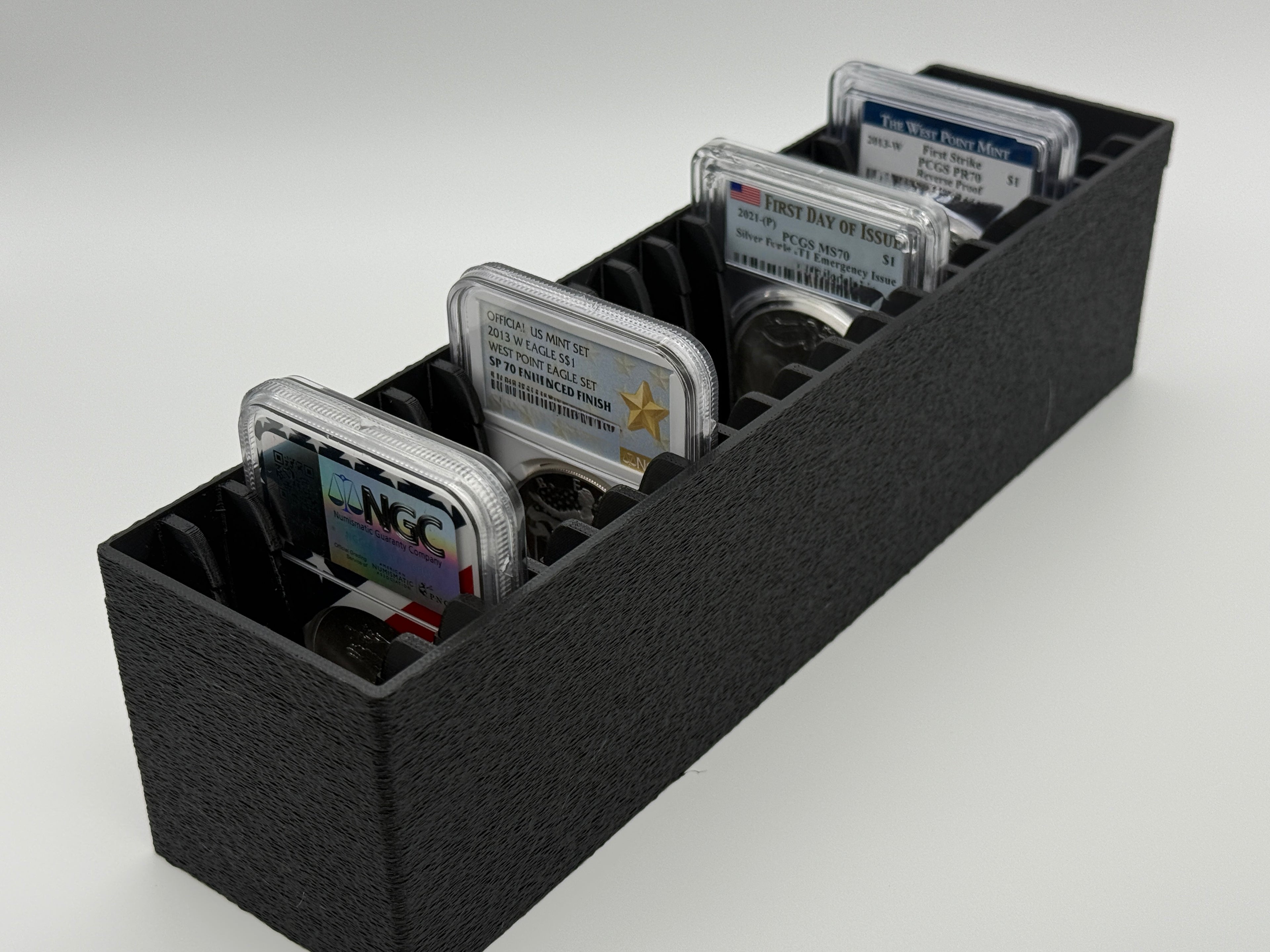 Black 3D-printed SlabGrid display tray for 20 graded coin slabs (NGC, PCGS)