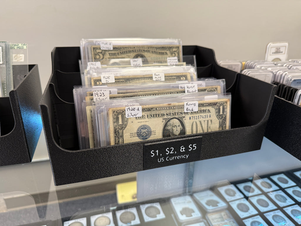 Deep channels of the CurrencyStadium tray fitting thick graded banknote holders