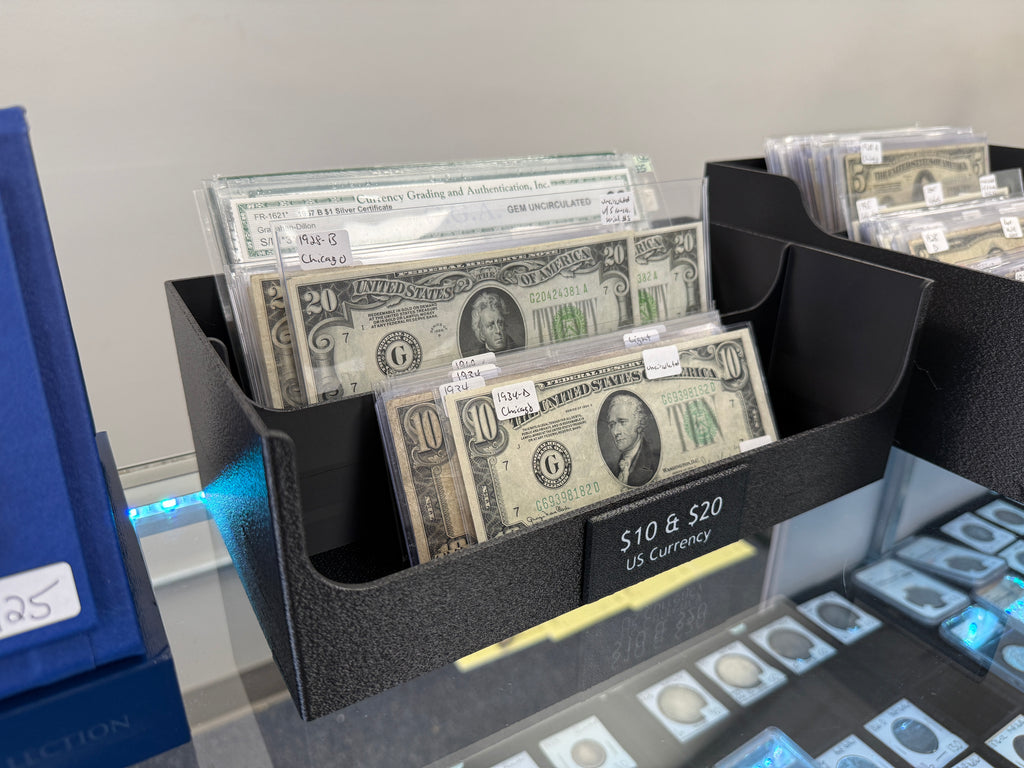 Angled view of the CurrencyStadium deep tray with graded currency notes displayed