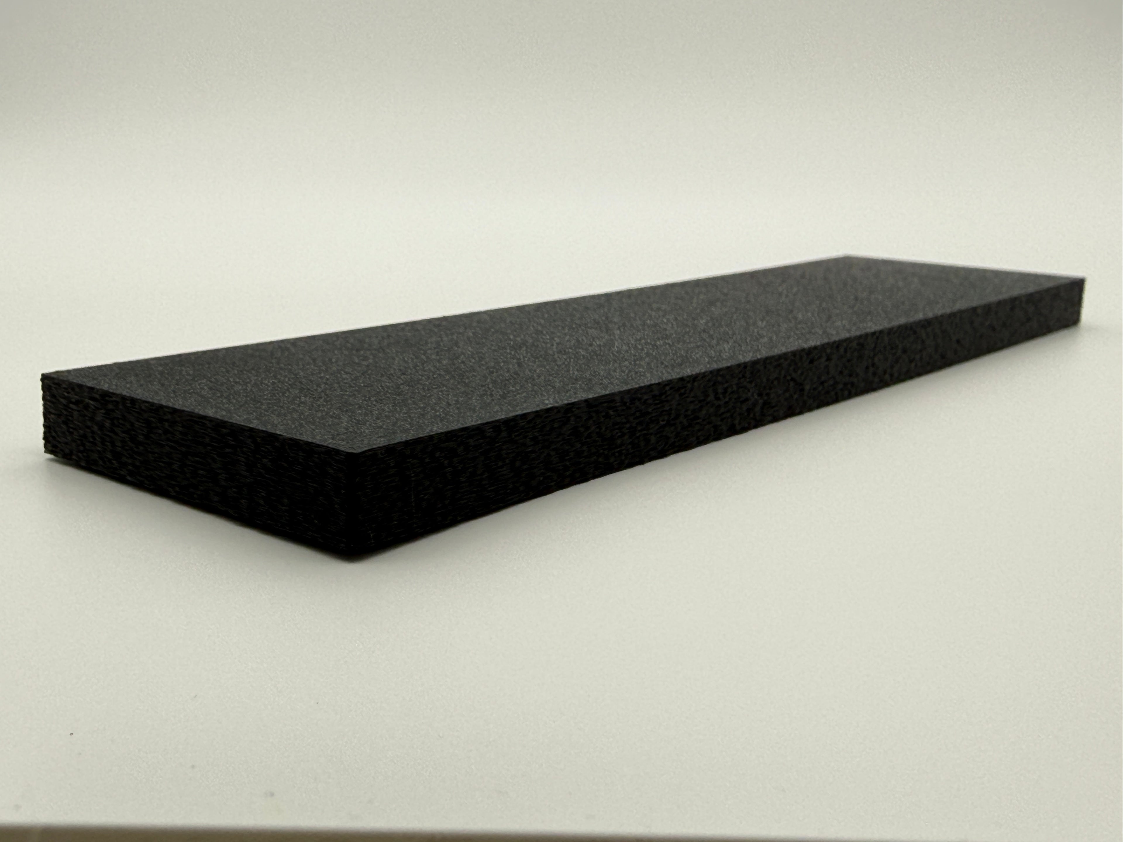 Black 3D-printed protective lid for the SlabGrid Mini 2x2 coin holder display